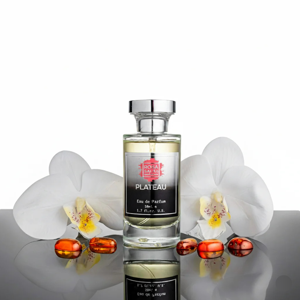 Perfume bottle labeled 'Plateau' with white orchids and red berries on a reflective surface.